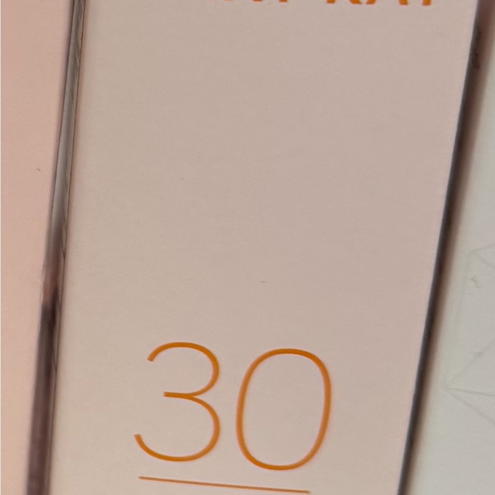 Mary Kay SPF 30 Face Sunscreen - White with Orange Accents